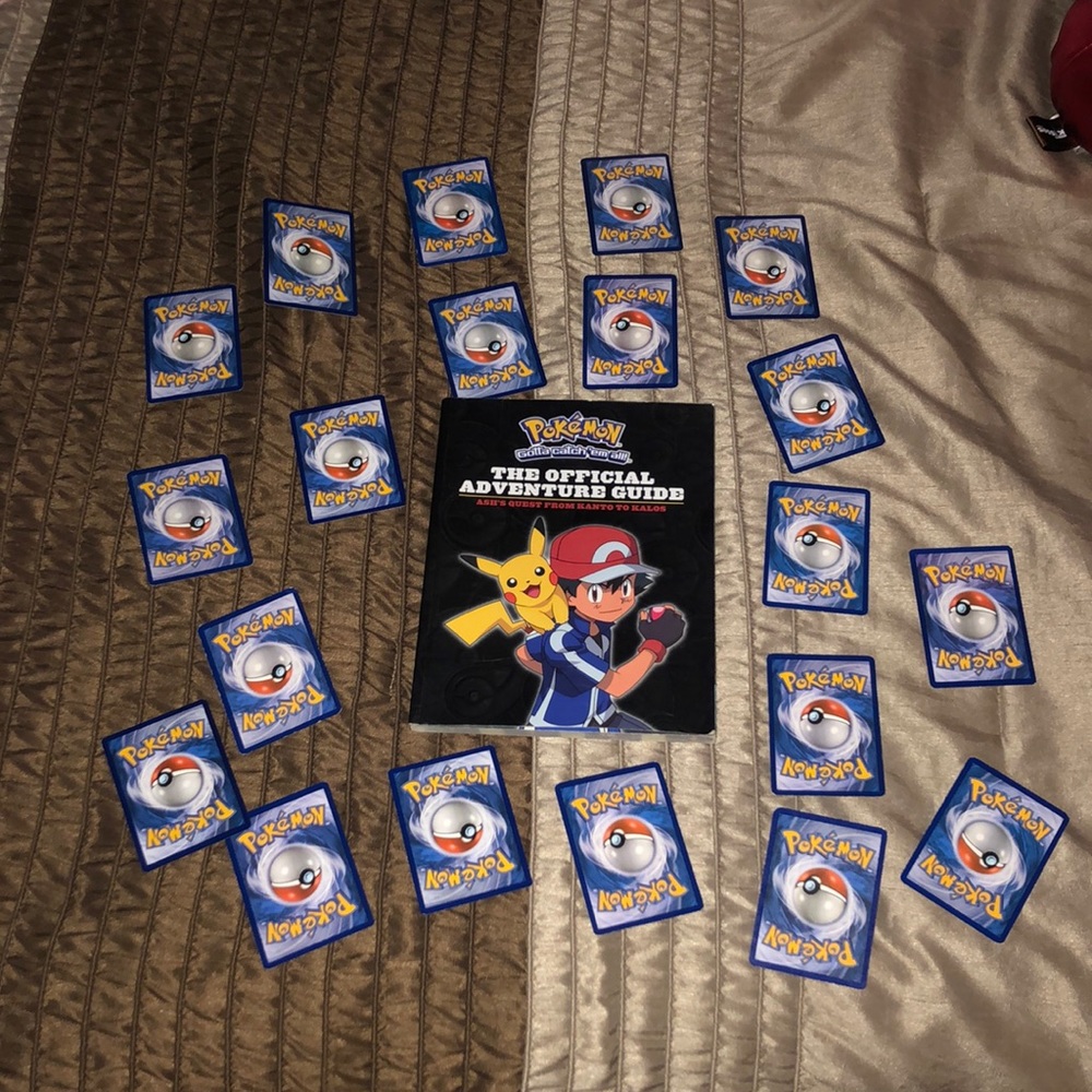 Pokémon Book and 20 random Cards